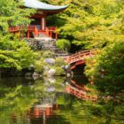 red temple near body of water